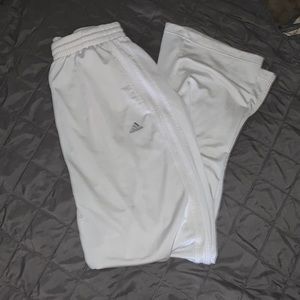 All white Adidas track pants